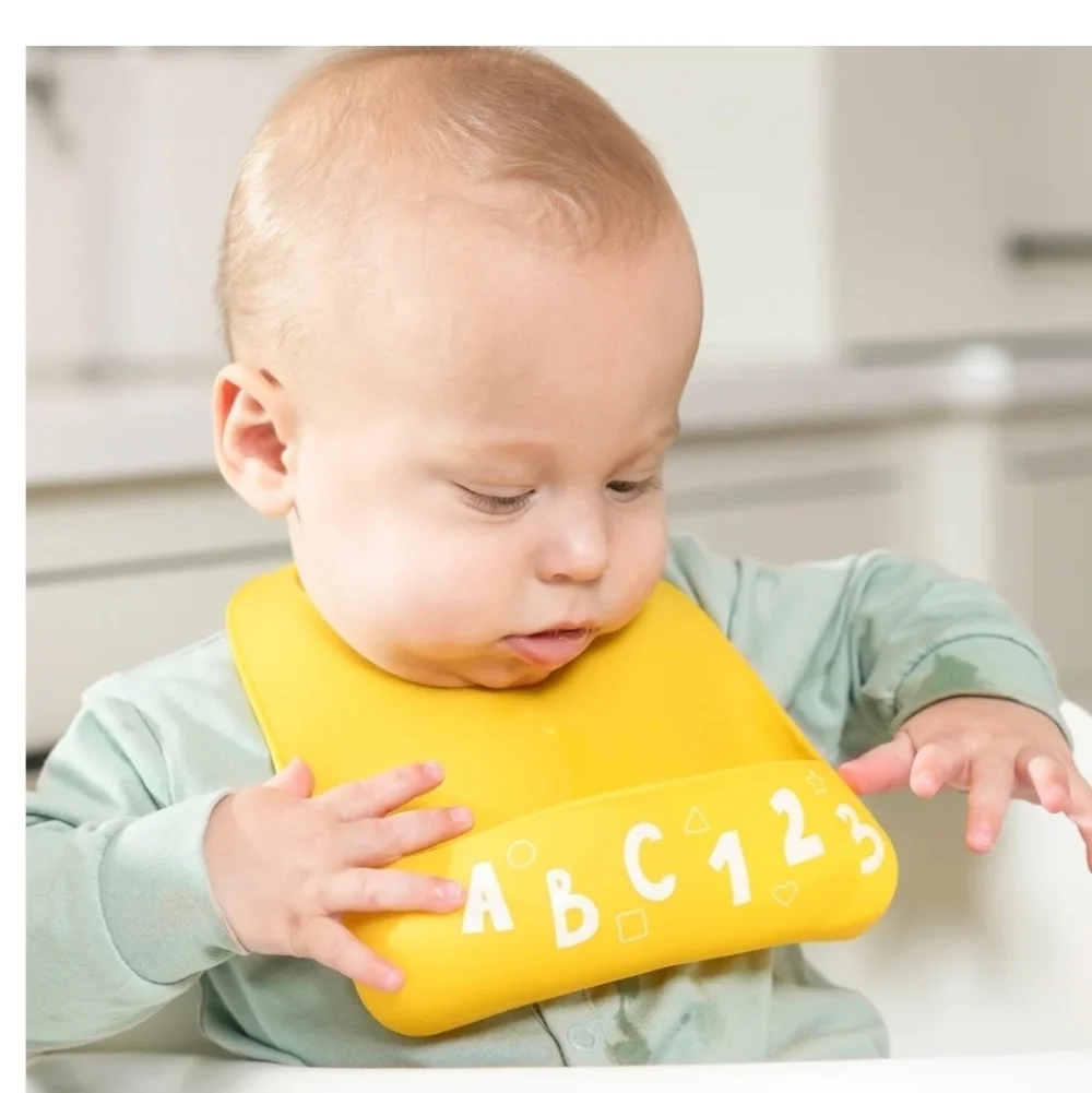 Bella Tunno Little Bites Silicone Bib NWT Learn to Eat Beginner 0+ ABCs Yellow